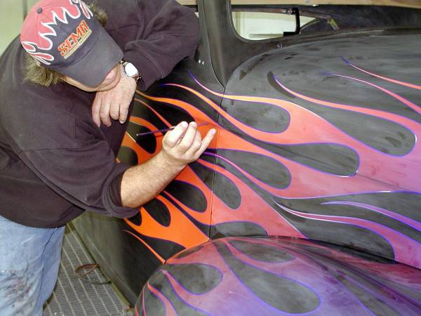 Pinstriping by hand in progress